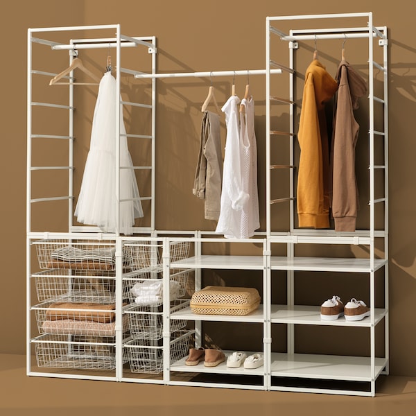A JONAXEL wardrobe combination with shelves, clothes rails and wire baskets holding clothes and shoes.